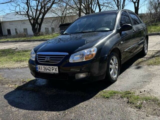 Черный Киа Черато, объемом двигателя 1.6 л и пробегом 224 тыс. км за 4000 $, фото 1 на Automoto.ua