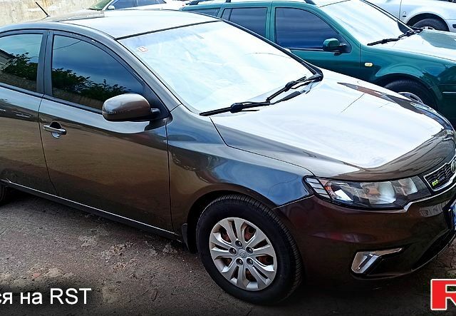 Коричневий Кіа Черато, об'ємом двигуна 1.6 л та пробігом 133 тис. км за 7400 $, фото 1 на Automoto.ua
