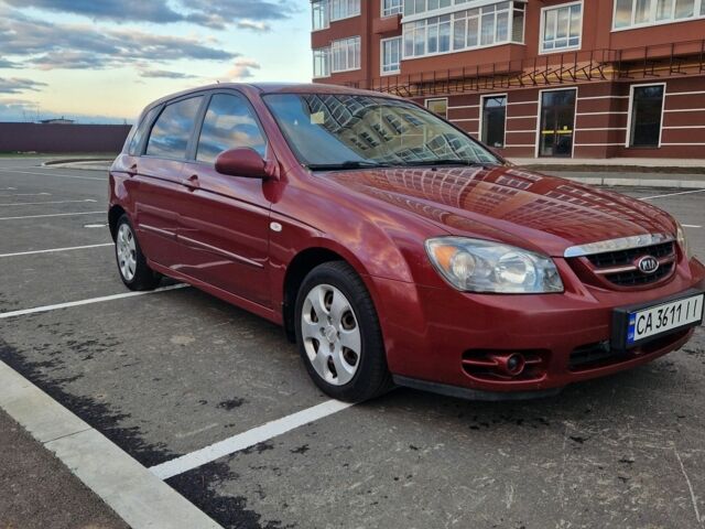 Красный Киа Черато, объемом двигателя 1.6 л и пробегом 260 тыс. км за 3650 $, фото 1 на Automoto.ua