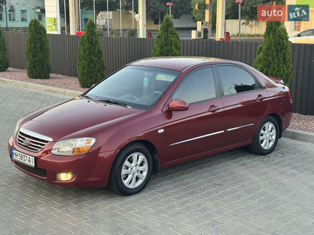 Красный Киа Черато, объемом двигателя 1.98 л и пробегом 180 тыс. км за 5600 $, фото 1 на Automoto.ua