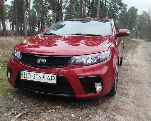Червоний Кіа Черато, об'ємом двигуна 2 л та пробігом 345 тис. км за 6800 $, фото 1 на Automoto.ua