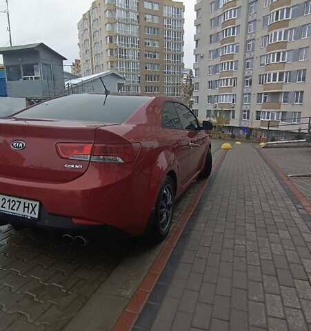 Красный Киа Черато, объемом двигателя 2 л и пробегом 210 тыс. км за 5500 $, фото 1 на Automoto.ua