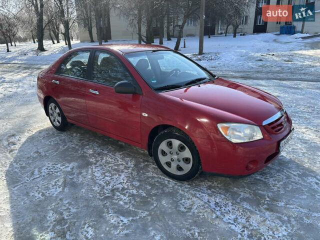 Красный Киа Черато, объемом двигателя 1.6 л и пробегом 200 тыс. км за 3700 $, фото 1 на Automoto.ua