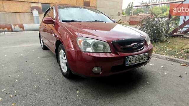 Красный Киа Черато, объемом двигателя 2 л и пробегом 140 тыс. км за 4500 $, фото 1 на Automoto.ua