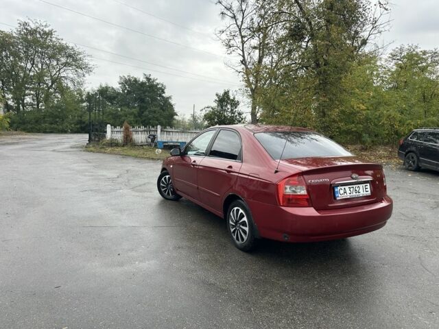 Красный Киа Черато, объемом двигателя 1.6 л и пробегом 228 тыс. км за 3850 $, фото 1 на Automoto.ua