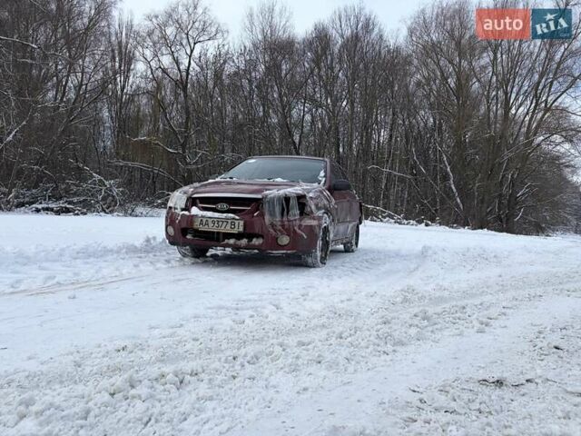 Красный Киа Черато, объемом двигателя 1.6 л и пробегом 315 тыс. км за 1800 $, фото 1 на Automoto.ua