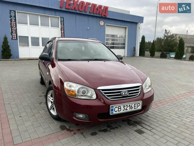 Красный Киа Черато, объемом двигателя 1.6 л и пробегом 225 тыс. км за 4200 $, фото 1 на Automoto.ua