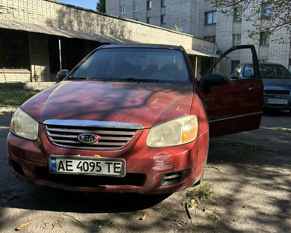 Красный Киа Черато, объемом двигателя 1.6 л и пробегом 188 тыс. км за 4000 $, фото 1 на Automoto.ua