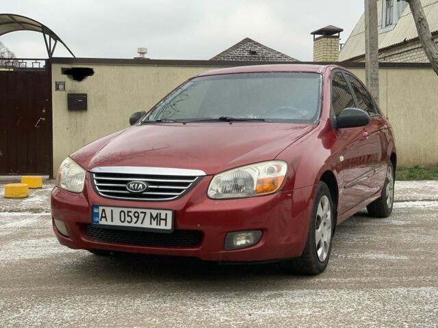 Красный Киа Черато, объемом двигателя 1.6 л и пробегом 180 тыс. км за 3999 $, фото 1 на Automoto.ua