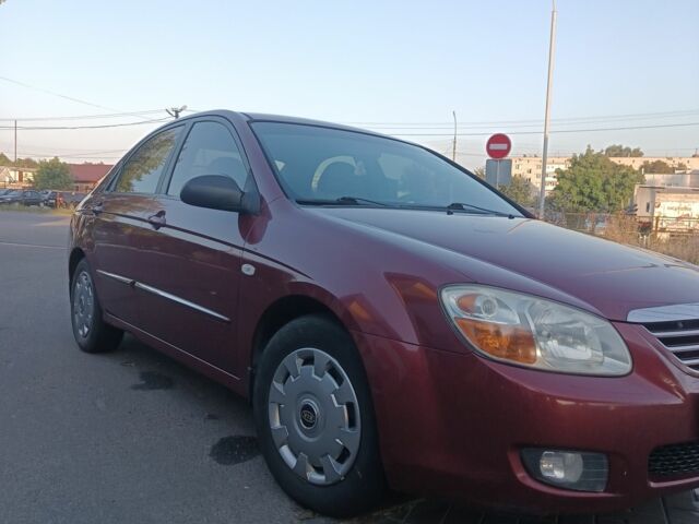 Красный Киа Черато, объемом двигателя 1.6 л и пробегом 298 тыс. км за 4500 $, фото 1 на Automoto.ua