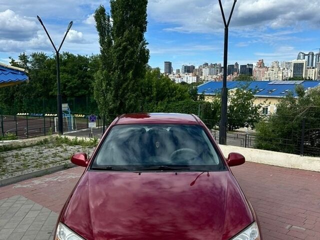 Червоний Кіа Черато, об'ємом двигуна 2 л та пробігом 323 тис. км за 4000 $, фото 1 на Automoto.ua