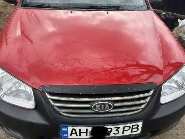 Красный Киа Черато, объемом двигателя 1.6 л и пробегом 205 тыс. км за 3836 $, фото 1 на Automoto.ua