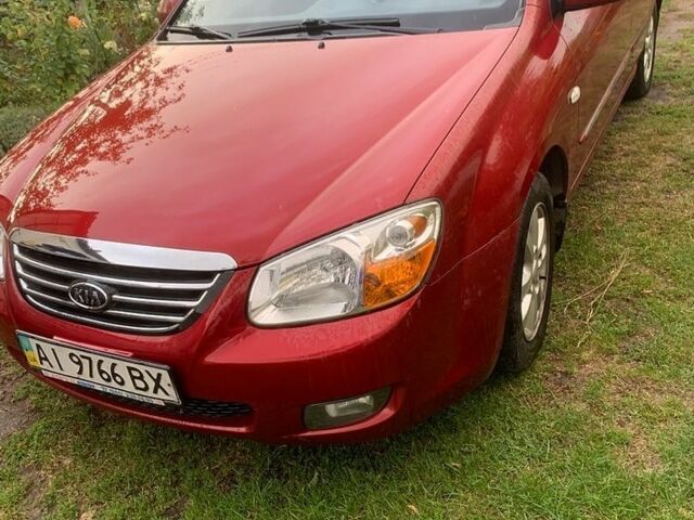 Красный Киа Черато, объемом двигателя 1.98 л и пробегом 199 тыс. км за 5200 $, фото 1 на Automoto.ua