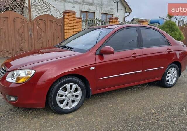 Красный Киа Черато, объемом двигателя 1.98 л и пробегом 120 тыс. км за 5650 $, фото 1 на Automoto.ua