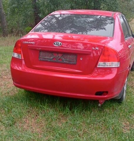 Красный Киа Черато, объемом двигателя 1.6 л и пробегом 250 тыс. км за 1200 $, фото 1 на Automoto.ua