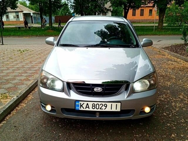 Серый Киа Черато, объемом двигателя 2 л и пробегом 340 тыс. км за 5100 $, фото 1 на Automoto.ua