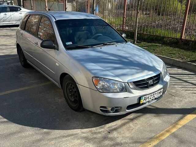 Серый Киа Черато, объемом двигателя 2 л и пробегом 326 тыс. км за 3500 $, фото 1 на Automoto.ua