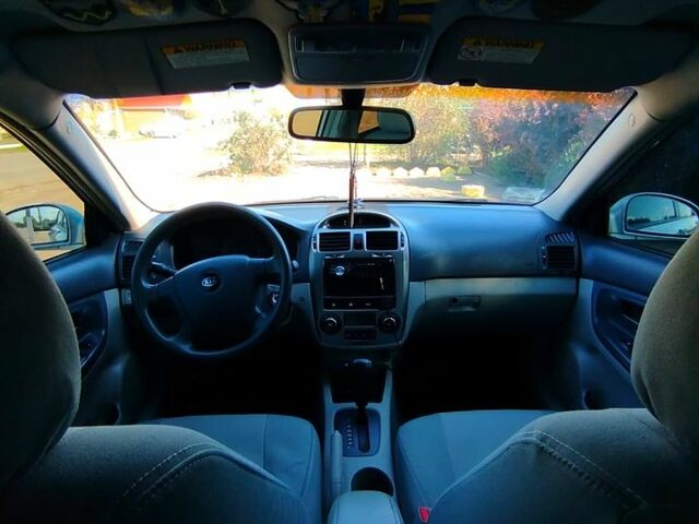 Серый Киа Черато, объемом двигателя 2 л и пробегом 180 тыс. км за 4100 $, фото 1 на Automoto.ua