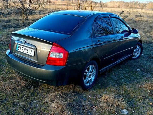 Серый Киа Черато, объемом двигателя 1.6 л и пробегом 192 тыс. км за 3500 $, фото 1 на Automoto.ua