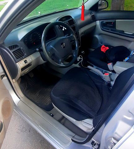 Серый Киа Черато, объемом двигателя 1.6 л и пробегом 267 тыс. км за 4650 $, фото 1 на Automoto.ua