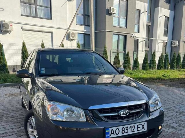 Серый Киа Черато, объемом двигателя 2 л и пробегом 280 тыс. км за 4250 $, фото 1 на Automoto.ua