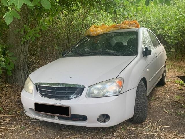 Сірий Кіа Черато, об'ємом двигуна 1.6 л та пробігом 303 тис. км за 1500 $, фото 1 на Automoto.ua