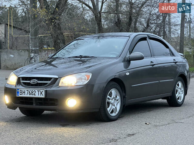 Серый Киа Черато, объемом двигателя 1.98 л и пробегом 213 тыс. км за 4900 $, фото 1 на Automoto.ua