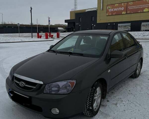 Серый Киа Черато, объемом двигателя 2 л и пробегом 316 тыс. км за 4200 $, фото 1 на Automoto.ua