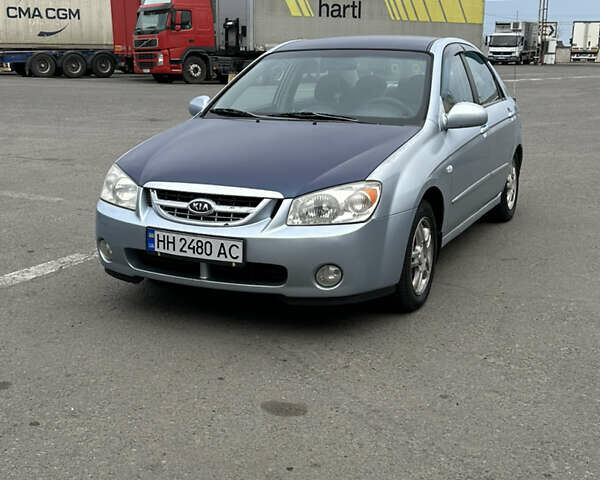 Серый Киа Черато, объемом двигателя 2 л и пробегом 430 тыс. км за 3900 $, фото 1 на Automoto.ua