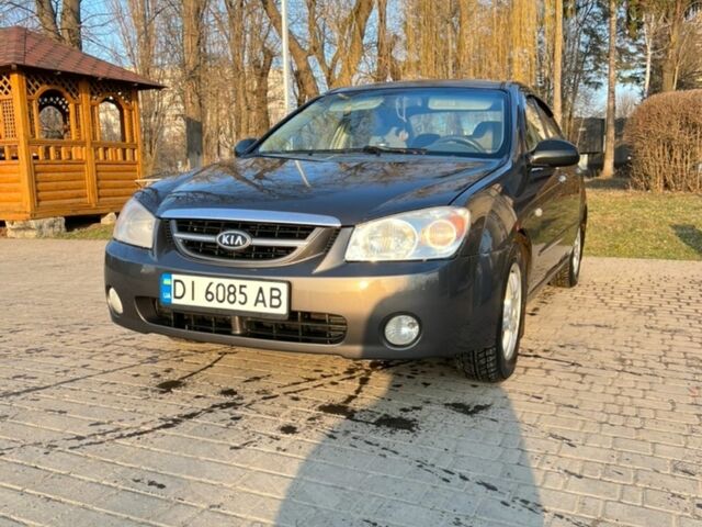 Серый Киа Черато, объемом двигателя 1.98 л и пробегом 250 тыс. км за 3800 $, фото 1 на Automoto.ua