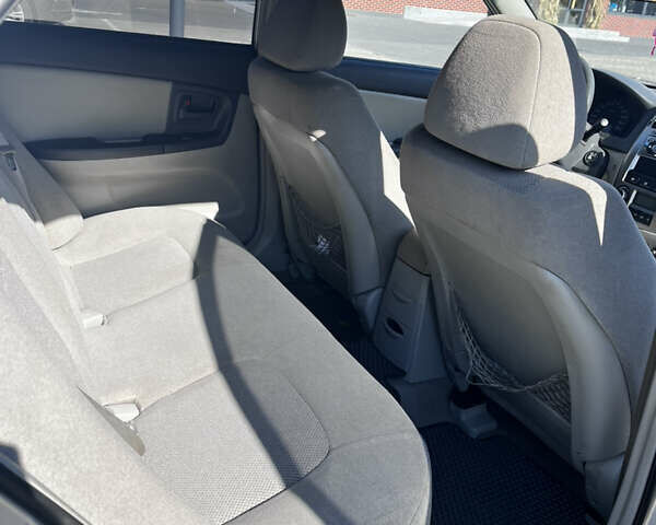 Сірий Кіа Черато, об'ємом двигуна 1.59 л та пробігом 183 тис. км за 4000 $, фото 1 на Automoto.ua