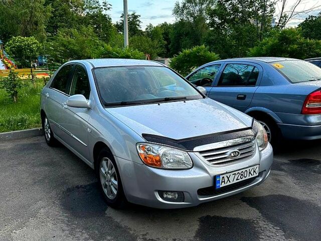 Сірий Кіа Черато, об'ємом двигуна 2 л та пробігом 215 тис. км за 5400 $, фото 1 на Automoto.ua