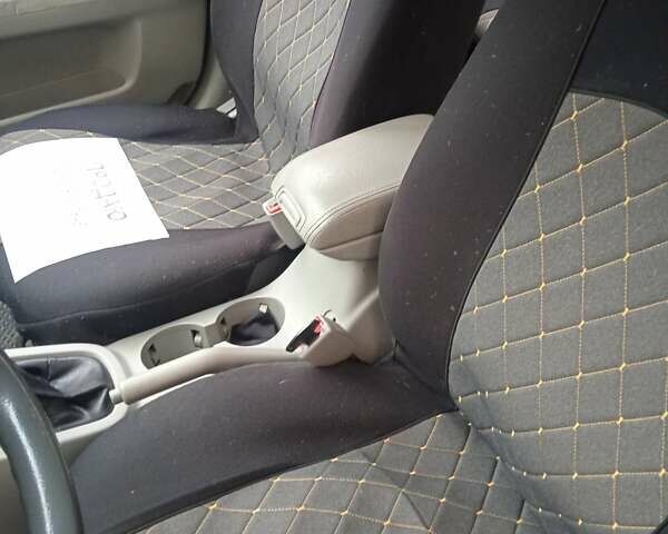 Серый Киа Черато, объемом двигателя 1.59 л и пробегом 240 тыс. км за 3500 $, фото 1 на Automoto.ua