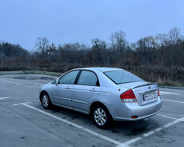 Серый Киа Черато, объемом двигателя 2 л и пробегом 326 тыс. км за 4200 $, фото 1 на Automoto.ua