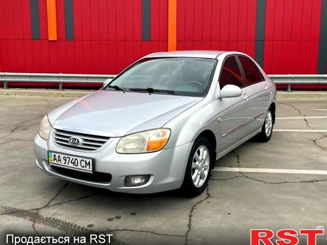 Серый Киа Черато, объемом двигателя 2 л и пробегом 230 тыс. км за 4067 $, фото 1 на Automoto.ua