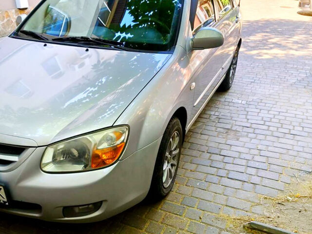 Серый Киа Черато, объемом двигателя 2 л и пробегом 186 тыс. км за 5800 $, фото 1 на Automoto.ua