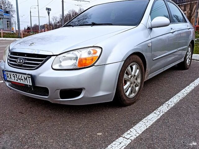 Серый Киа Черато, объемом двигателя 2 л и пробегом 290 тыс. км за 3800 $, фото 1 на Automoto.ua