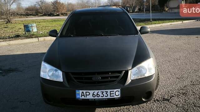 Серый Киа Черато, объемом двигателя 2 л и пробегом 310 тыс. км за 4500 $, фото 1 на Automoto.ua