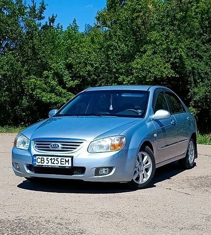 Серый Киа Черато, объемом двигателя 2 л и пробегом 417 тыс. км за 3700 $, фото 1 на Automoto.ua