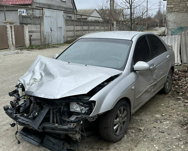 Серый Киа Черато, объемом двигателя 1.6 л и пробегом 210 тыс. км за 1900 $, фото 1 на Automoto.ua