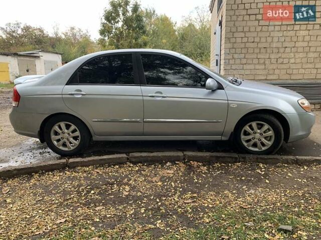 Сірий Кіа Черато, об'ємом двигуна 2 л та пробігом 199 тис. км за 5099 $, фото 1 на Automoto.ua