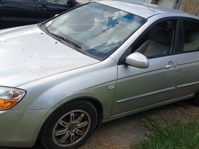 Серый Киа Черато, объемом двигателя 1.6 л и пробегом 130 тыс. км за 2019 $, фото 1 на Automoto.ua