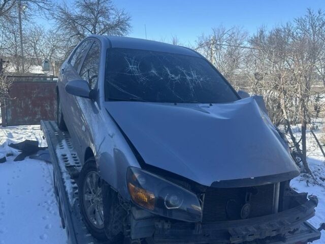 Серый Киа Черато, объемом двигателя 2 л и пробегом 170 тыс. км за 2800 $, фото 1 на Automoto.ua