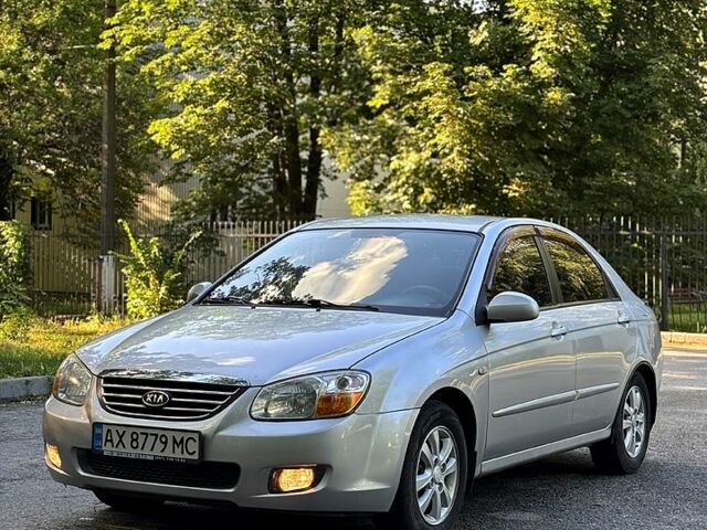 Серый Киа Черато, объемом двигателя 2 л и пробегом 215 тыс. км за 4950 $, фото 1 на Automoto.ua