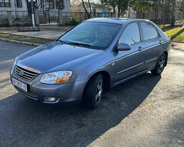 Серый Киа Черато, объемом двигателя 1.98 л и пробегом 235 тыс. км за 3500 $, фото 1 на Automoto.ua