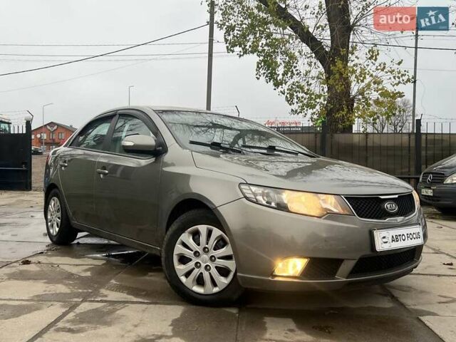 Сірий Кіа Черато, об'ємом двигуна 2 л та пробігом 198 тис. км за 6490 $, фото 1 на Automoto.ua