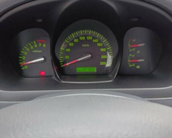 Серый Киа Черато, объемом двигателя 1.6 л и пробегом 200 тыс. км за 4100 $, фото 1 на Automoto.ua