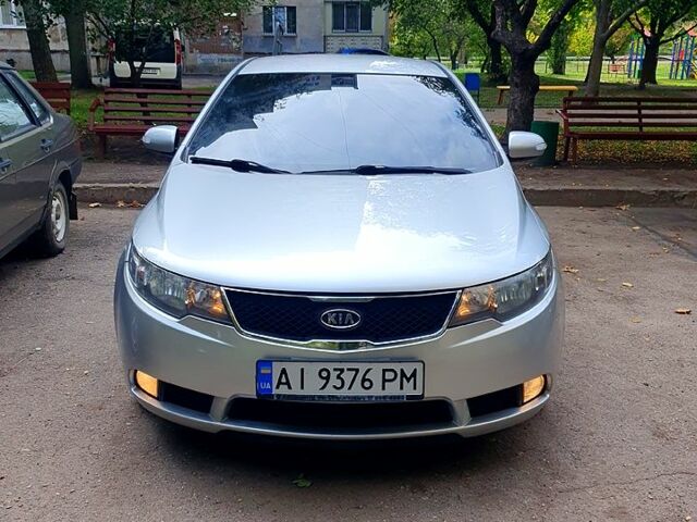 Серый Киа Черато, объемом двигателя 2 л и пробегом 230 тыс. км за 6300 $, фото 1 на Automoto.ua