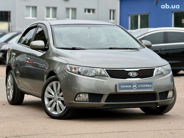 Серый Киа Черато, объемом двигателя 2 л и пробегом 170 тыс. км за 7900 $, фото 1 на Automoto.ua