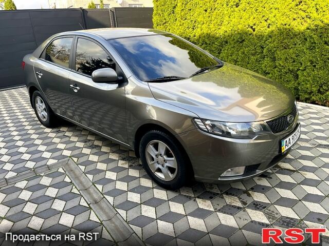 Серый Киа Черато, объемом двигателя 2 л и пробегом 190 тыс. км за 7300 $, фото 1 на Automoto.ua